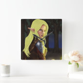 Cassa sitzt an einem Lagerfeuer Quadratische Wanduhr (Zuhause)