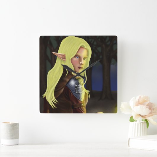 Cassa sitzt an einem Lagerfeuer Quadratische Wanduhr (Zuhause)