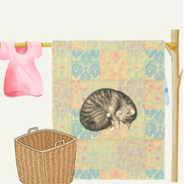 Cat curled up sleeping on quilt cute cozy fleecedecke