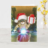 Cat in the Santa Claus hat delivers Christmas gift Karte (Gelbe Blume)