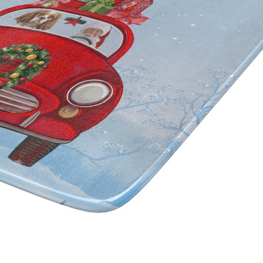 Cavalier King Dog in Auto mit dem Weihnachtsmann Schneidebrett (Ecke)