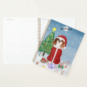 Cavalier King Dog in Snow mit Weihnachtsgeschenken Planer
