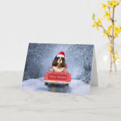 Cavalier King in Snow sitzend im Weihnachtswagen Karte (Gelbe Blume)