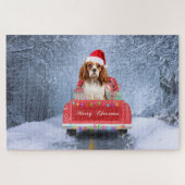 Cavalier King in Snow sitzend im Weihnachtswagen Puzzle (Horizontal)