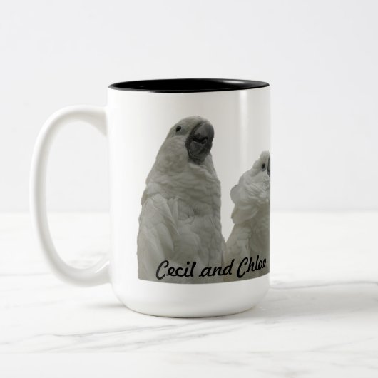 Cecil- und Chloe-Tasse Zweifarbige Tasse (Links)