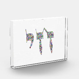 Chai-Symbol aus Edelsteinen in allen Farben Fotoblock