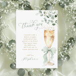 Champagne Toast Greenery Thank You Card Dankeskarte<br><div class="desc">Send a touch of botanical beauty and heartfelt thanks with these exquisite bridal shower thank you cards. The design features a captivating illustration of a champagne flute, elegantly tied with a sage green ribbon and surrounded by a garland of fresh eucalyptus. The delicate script and the natural, airy aesthetic provide...</div>