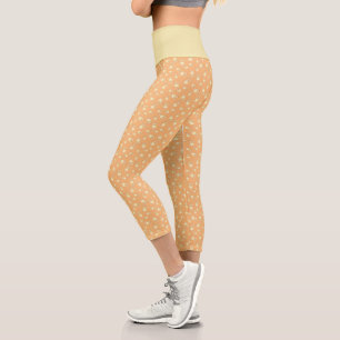 Champagnerherz gestopfte Leaf-Muster über Orange Capri Leggings
