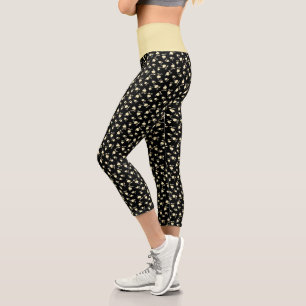 Champagnerherz über schwarz geprägtes Leaf-Muste Capri Leggings