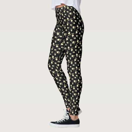 Champagnerherz über schwarz geprägtes Leaf-Muster Leggings (Links)