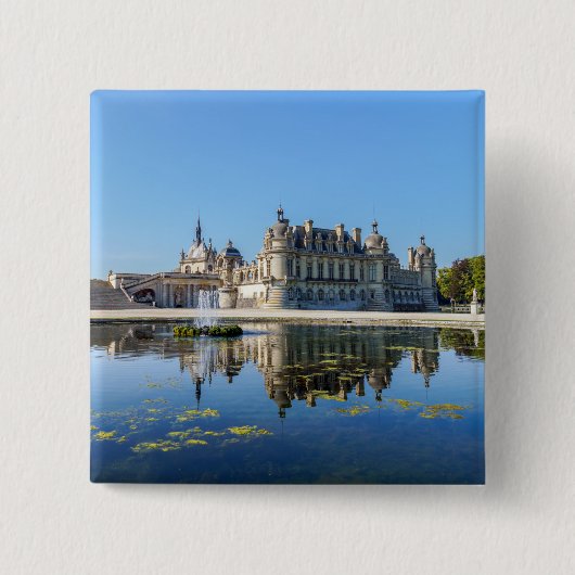 Chateau de Chantilly mit Reflektion in einem Teich Button (Vorderseite)