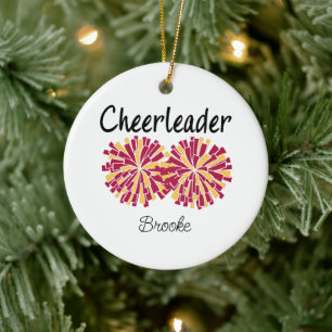 Cheerleader mit bordeauxroten und gelben/goldenen keramik ornament