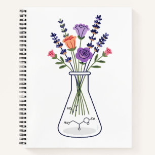 Chemiekolben mit Lavendel und Rose A Notizblock