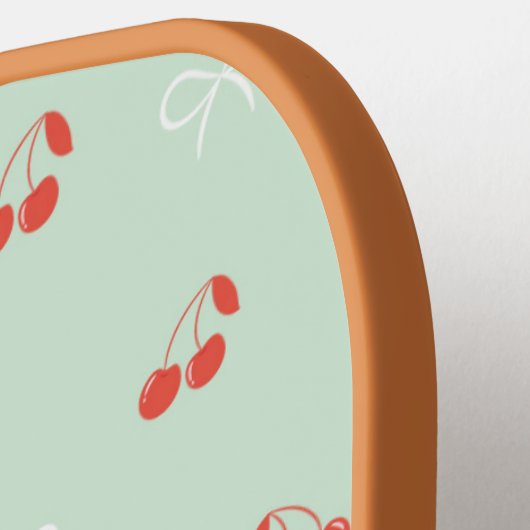 Cherry und Bow Light Green Pickleball Paddle (Linke Seite)