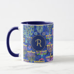 Chic Blue Gold Menorah Star von David Hanukkah Tasse<br><div class="desc">Diese individuelle Kaffee-Tasse bietet ein elegantes Muster aus Gold,  grünen und lila Menorah und Goldstar von David auf einem blauen Hintergrund. Auf beiden Seiten ist ein blauer Kreis in Gold gebohrt,  damit Ihr Monogramm anfänglich personalisiert werden kann. Trinken Sie stilvoll! Entworfen von dem weltbekannten Künstler Tim Coffey.</div>