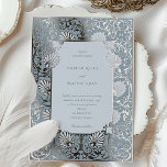 Chic Dusty Blue and Silver Foil Wedding Folieneinladung<br><div class="desc">Die Einführung unseres Chic Dusty Blue und Silver Foil Wedding Invitation Ensemble, wo Vintage trifft Vogue. Die Frontabdeckung besticht durch ihre staubige blaue Eleganz, mit einem zentralen Monogramm in einem leichteren Schatten, der von üppigen Blumenmustern gerahmt ist. Die Einladung ins Hinterland zeigt ein ausgeklügeltes Layout mit den Namen des Paares...</div>