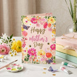 Chic Watercolor Floral Garden Photo Mother's Day Karte<br><div class="desc">Celebrate Mom with a card as vibrant and beautiful as she is. This "Happy Mother’s Day" greeting features a lush, hand-painted watercolor design overflowing with pink roses, yellow ranunculus, and delicate daisies. Charming bumblebees and butterflies flutter through the floral border, adding a touch of whimsical magic to the soft blush...</div>