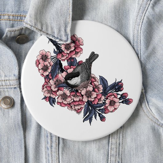 Chickadee auf einem blühenden Kirschzweig Button (Beispiel)