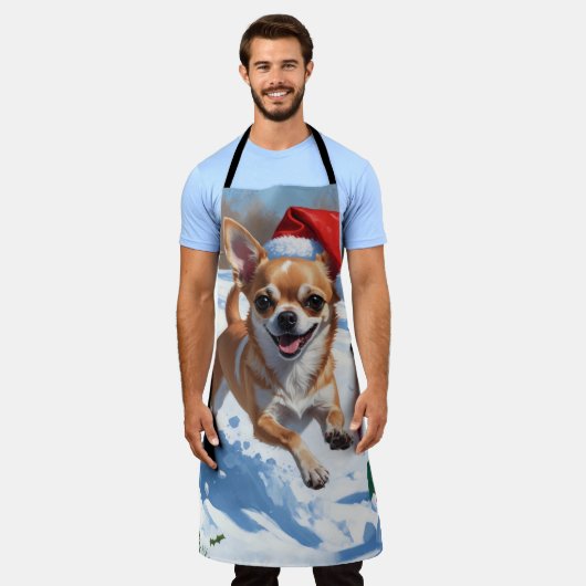 Chihuahua läuft in Schnee mit Weihnachtshut Schürze (Getragen)