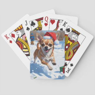 Chihuahua läuft in Schnee mit Weihnachtshut Spielkarten