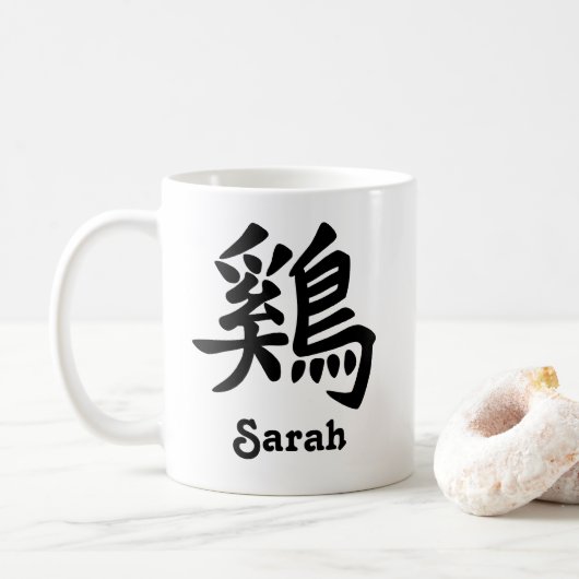 Chinesischer Zodiaka Jahr des Rooster-Namens Kaffeetasse (Mit Donut)