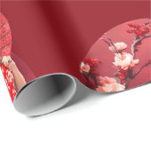 Chinesisches Neujahrsmädchen mit einem roten Regen Geschenkpapier (Rolleneckpunkt)