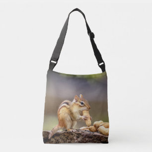 Chipmunk, der eine Erdnuss isst Tragetaschen Mit Langen Trägern