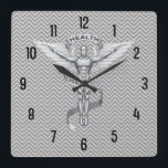 Chiropractic Emblem Logo Wall Clock Quadratische Wanduhr<br><div class="desc">This wall clock for chiropractors feature a metallic-look chiropractic emblem in the center on trendy chevron background. "Customize it!"  Beautiful gift for your favorite chiropractor!</div>