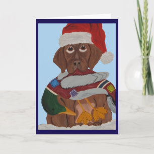 Chocolate-Labrador-Welpe mit Santa-Hut und Enten-S Karte