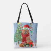 Chow Chow Hund im Schnee mit Weihnachtsgeschenke Tasche (Rückseite)