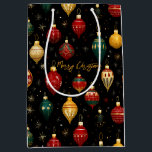 Christmas Bauble Ornament Bright Mittlere Geschenktüte<br><div class="desc">Eine farbenfrohe Weihnachtsgeschenktasche,  mit einem Design von glänzenden Baum-Ornamenten in leuchtenden Farben von goldrot und blau,  alles auf einem schwarzen Hintergrund. Die Formulierung "Frohe Weihnachten" in goldfarbenem Schriftart kann mit jedem Gruß nach Bedarf angepasst werden oder personalisieren mit einem Namen.</div>