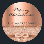 Christmas copper metallic elegant name runder aufkleber<br><div class="desc">A faux copper metallic looking background with an elegant faux copper bow and ribbon. With the text,  Merry Christmas,  written with a modern hand lettered style script. Template for Your Family name. Black letters and text.</div>