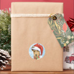 Christmas Lakeland Terrier Runder Aufkleber<br><div class="desc">Feiern Sie die Urlaubssaison mit einem niedlichen Welpe aus Lakeland Terrier mit Weihnachtsmannmütze und Schal inmitten eines Haufen Schneeflocken. Eine tolle Geschenkidee für Lakie-liebende Familien und Freunde.</div>