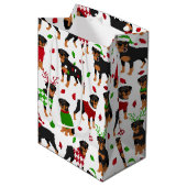 Christmas Rottweiler Mittlere Geschenktasche Mittlere Geschenktüte (Vorderseite Schrägansicht)