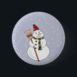 Christmas Snowman Button<br><div class="desc">Ein glücklicher Schneemann,  der eine Weihnachtsmannmütze trug,  in der Schnee um ihn schwebte.</div>