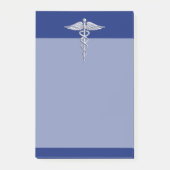 Chrom mag Caduceus-medizinisches Symbol auf blauem Post-it Klebezettel (Vorderseite)