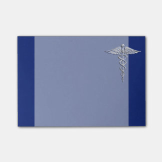 Chrom wie Caduceus Medical Symbol auf blauem Dekor Post-it Klebezettel