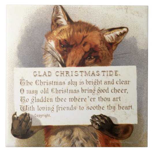 Circa 1900: Ein Fuchs hält ein Weihnachtsversum Fliese (Vorderseite)