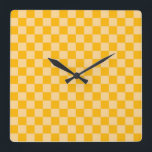 Citrus cream checkered board pattern quadratische wanduhr<br><div class="desc">A vibrant orange and beige checkerboard pattern with alternating bright and muted squares,  creating a lively and symmetrical design with a warm,  energetic tone.</div>