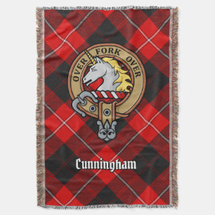 Clan Cunningham-Wappen über Tartan Decke