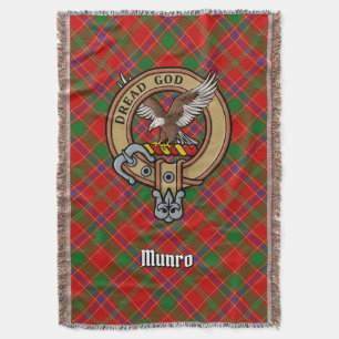 Clan Munro-Wappen über Tartan Decke