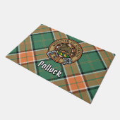 Clan Pollock Wappen über Tartan Fußmatte (Schrägansicht)