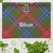 Clan Wilson Wappen über das moderne Tartan Geschirrtuch (Gefaltet)