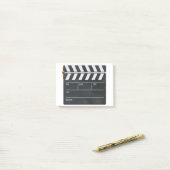 Clapperboard mit Kopierplatz für Personalisierung. Post-it Klebezettel (Auf Schreibtisch)