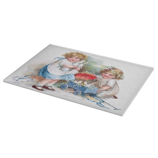 Clapsaddle: Mädchen, die mit Häschen spielen Schneidebrett (Ecke)