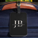 Classic Elegant Monogram und Name Black Gepäckanhänger<br><div class="desc">Dieses Gepäckanhänger in Schwarz und Elfenbeinbeige ist ein klassisches Aussehen, das für Sie ein besonderes Geschenk oder eine Leckerei ist. Es hat große Monogramm-Initialen, die Sie mit Ihren gewünschten Initialen personalisieren können, und auch den Namen, der in elegantem Serifengesicht angegeben ist. Es ist eine großartige Wahl für diejenigen, die häufig...</div>