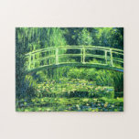 Claude Monet: Brücke über einem Teich der Puzzle<br><div class="desc">Ein wunderbares klassisches Puzzlespiel,  das eine Brücke über einem Teich der Wasserlilien,  gemalt vom französischen Impressionistmaler Claude Monet kennzeichnet.</div>