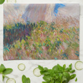 Claude Monet - Eine Frau mit einem Parasol gegenüb Geschirrtuch (Gefaltet)