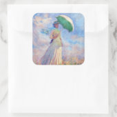 Claude Monet - Eine Frau mit einem Sonnenschirm au Quadratischer Aufkleber (Tasche)