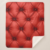 Close up background texture of scarlet red capiton sherpadecke (Vorderseite)